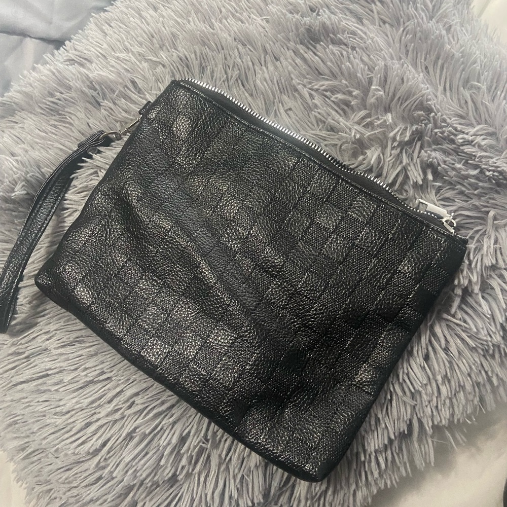 Black leather wrist bag